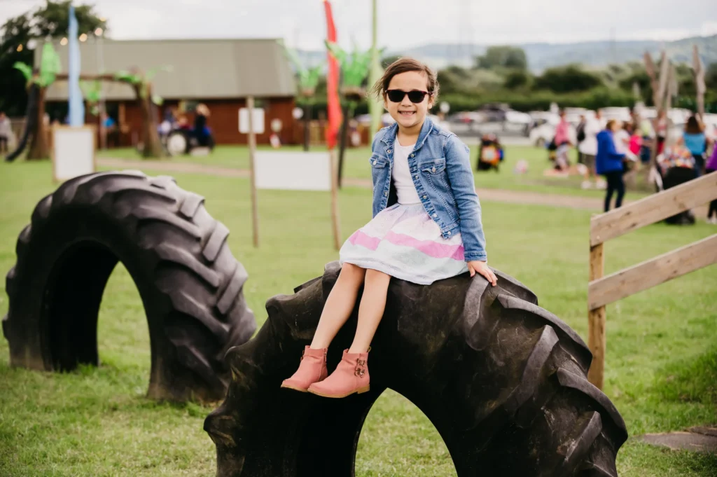 Girl on tractor tyres